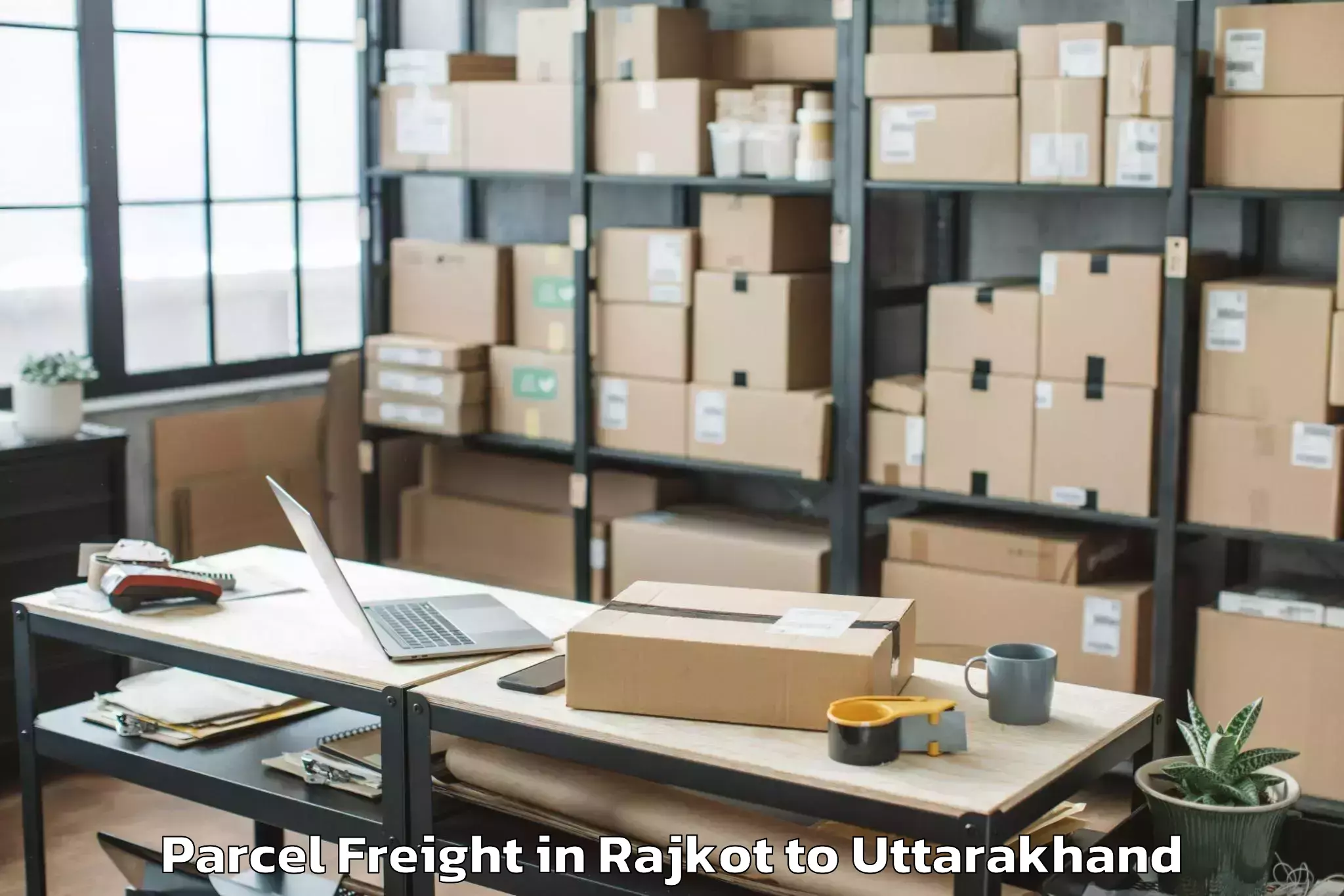 Easy Rajkot to Kashipur Parcel Freight Booking